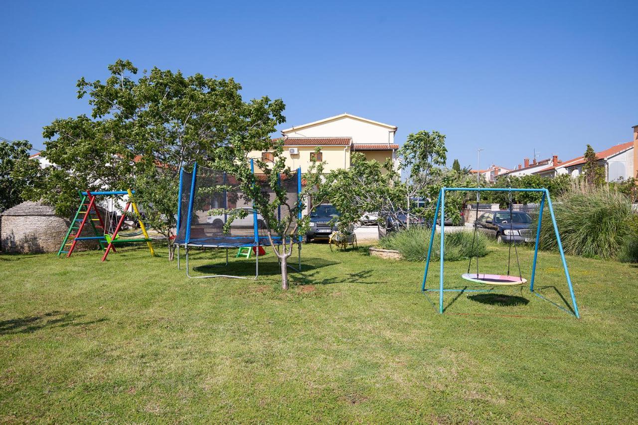Modern Stone House With Flowers & Playground Medulin